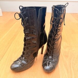 Beautiful black patent leather laced up boots, stiletto heels ; size  7.5